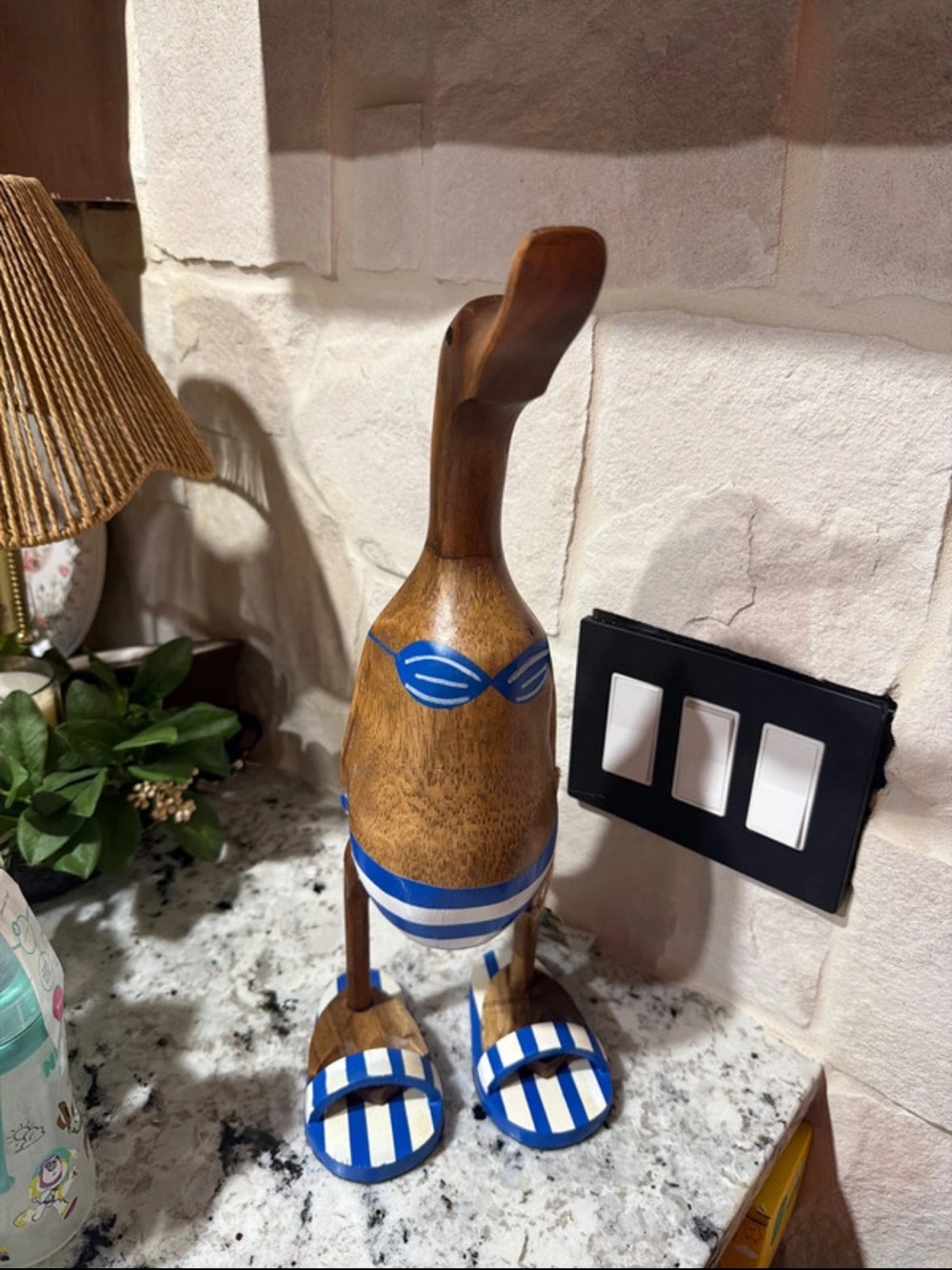 Handcrafted Wooden Duck Figurine with Blue Stripes